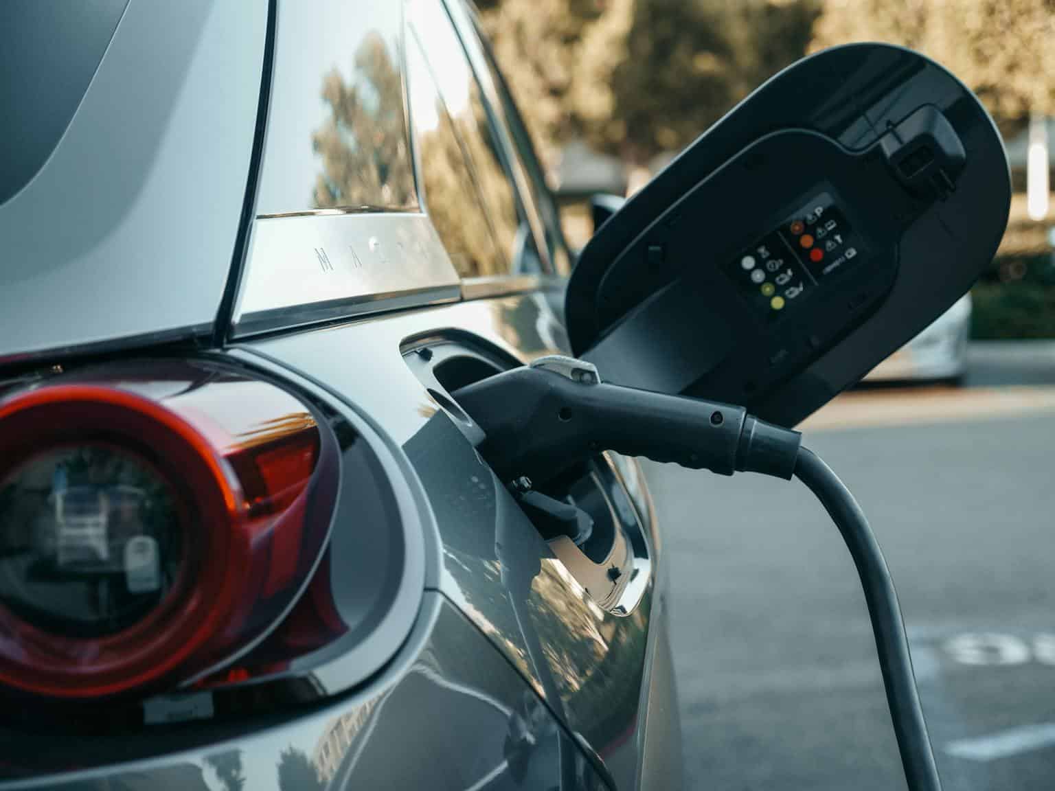 EV being charged in Upstate SC Close-up of an electric vehicle being charged in Upstate SC, highlighting modern clean energy technology.
